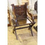 Carved oak ecclesiastical chair.