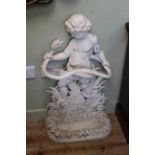 Cast iron stick stand in the form of a child grasping a coiling snake, 84cm tall.