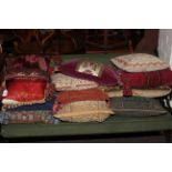 Collection of twelve assorted scatter cushions.