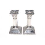 Pair of silver corinthian column candlesticks, Sheffield 1889, loaded, 14cm.