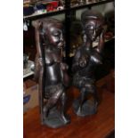 Pair of ethnic carved wood figures.