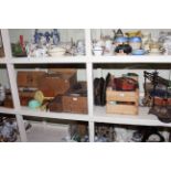 Large collection of tools, tins, scales, camera, weights, wooden crates.