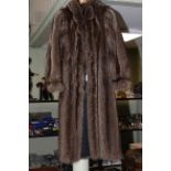 Ladies full length fur coat.