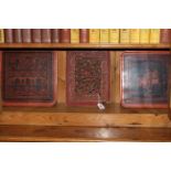 Two Chinese red lacquered trays and carved panel.