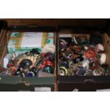 Two boxes of costume jewellery.