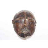 Antique African hardwood face mask, 24cm by 18cm.