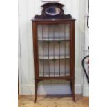 Edwardian mahogany, line inlaid and painted mirror back bow front vitrine with leaded glass door,