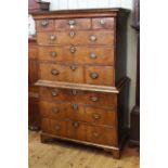 George III walnut crossbanded and oak chest on chest having three short drawers above six long