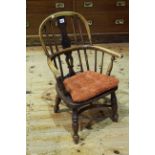 Antique child's Windsor elm splat back chair with crinoline stretcher.