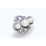 Cultured pearl and sapphire cocktail ring set in 14 carat white gold, size N.