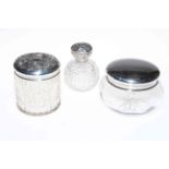 Two silver topped toilet jars and scent bottle (3).