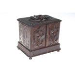 Carved Black Forest pipe cabinet, 21cm by 22cm.