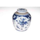 Large Chinese blue and white ginger jar, with two panels of artifacts on prunus ground.