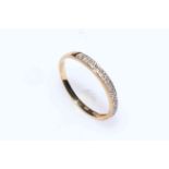 9 carat gold and diamond set half eternity ring, size V.