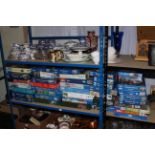 Large collection of jigsaw puzzles.