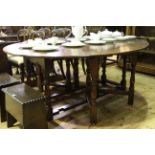 Good quality oval oak drop leaf wake table, 198cm by 152cm (open).