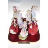 Three Royal Doulton and four Royal Worcester 'Seasons' figurines (7).
