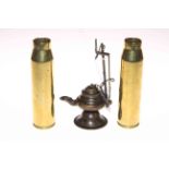 Pair small brass shell cases and whale oil lamp (2).