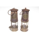 Two Eccles Protector miners lamps.
