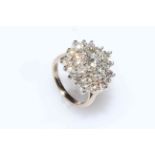 Impressive diamond cluster ring set in 18 carat gold,