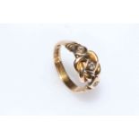 18 carat gold, three stone diamond ring, size R.