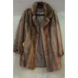 Ladies mink coat, with 1979 Binns receipt.