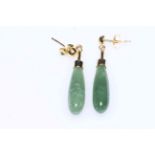 Pair of 14 carat gold and jade earrings.