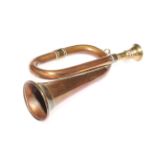Tiny brass and copper bugle.