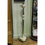 Victorian brass and ceramic standard oil lamp on three paw feet, 153cm tall.