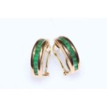 Pair of 14 carat yellow gold and emerald earrings.