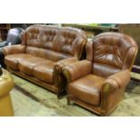 Bardi, Italy dark tan leather three seater settee and chair with burr wood fascia.