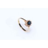 9 carat gold and sapphire and diamond cluster ring, size J.