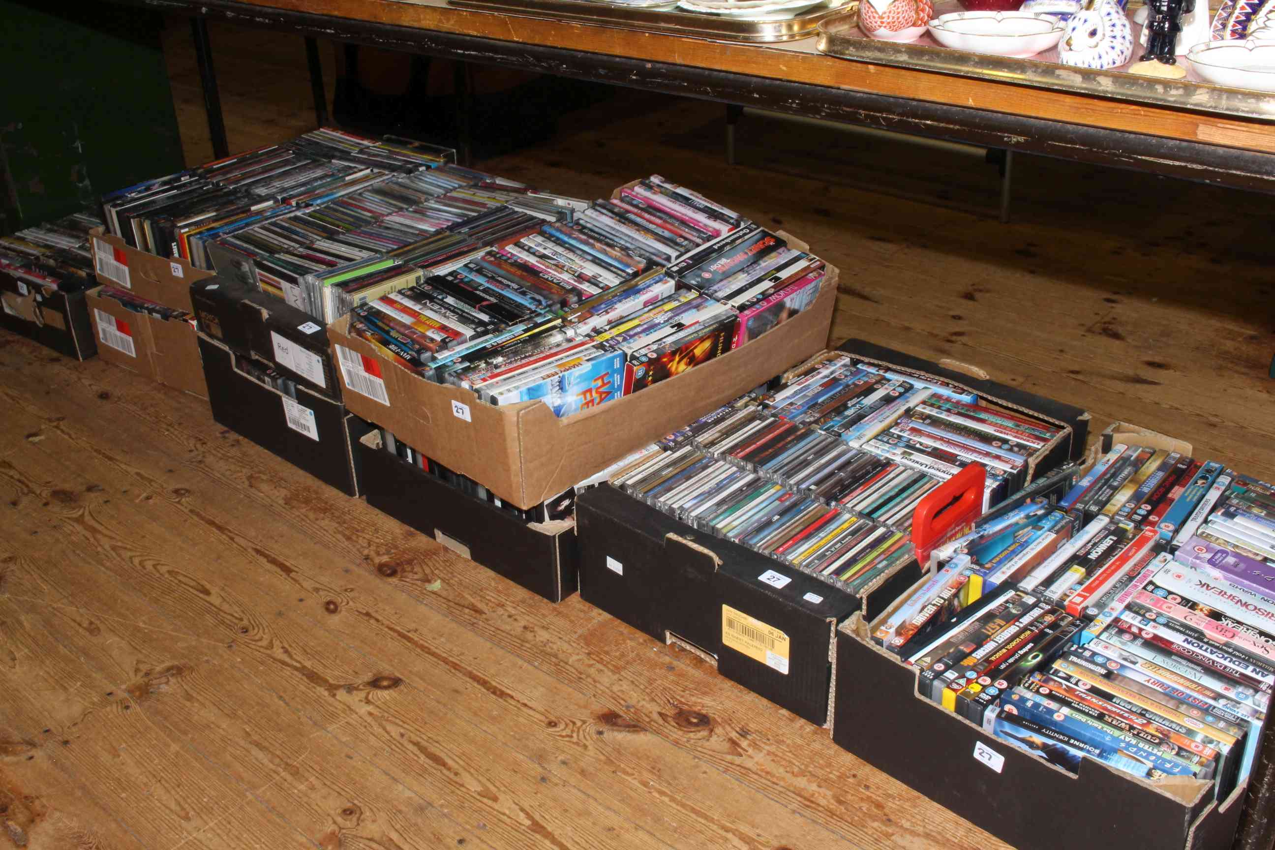 Nine boxes of DVD's and CD's.