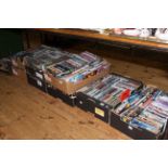 Nine boxes of DVD's and CD's.