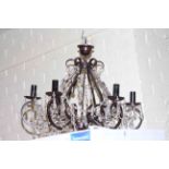 Wrought iron stool, six branch lustre drop chandelier and glazed pottery table lamp and shade (3).