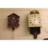 Arched dial clock movement and cuckoo clock (2).