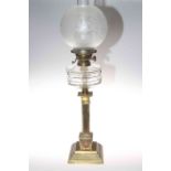 Victorian brass square reeded column oil lamp with a clear glass reservoir and etched shade, 75cm.