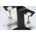 Pair of cultured pearl drop earrings in 18 carat yellow gold.
