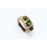 Tourmaline and diamond heavy set 18 carat yellow gold ring, size I.