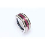 18 carat white gold, sapphire, diamond and ruby flip ring, size N.