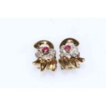 Pair of ruby and diamond clip on earrings.