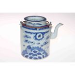 Antique Chinese blue and white cylindrical teapot with dragon and carp decoration.