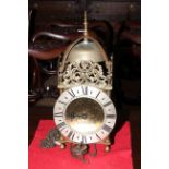 Brass lantern clock by Thomas Moore of Ipswich with 17cm diameter dial.