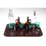 Small 19th Century decanter, two brown glass bottles, four green wine glasses and vintage bottle.