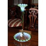 Green glass table epergne with central trumpet.