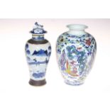 Chinese dragon decorated vase with six character mark and a blue and white vase (2).