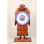 The Chinaman clock, exhibition quality, life size carved figure clock, holding a willow pattern