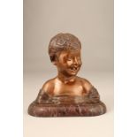 19th/20th Century French bronze bust, the laughing boy signed Pinedo, mounted to a marble base (Bust