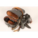 A pair of German WWII U-boat binoculars, by Carl Zeiss 7 x 50 with impressed swastika M in