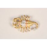 18 carat three colour gold diamond encrusted scorpion pendant. Articulated body and tail. Ruby